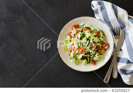 Healthy vegetable salad of fresh vegetables. Diet menu for lunch. Healthy vegetable salad of fresh vegetables. Diet menu for lunch. 61050827