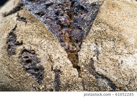 dark bread with a crisp crust 61052285