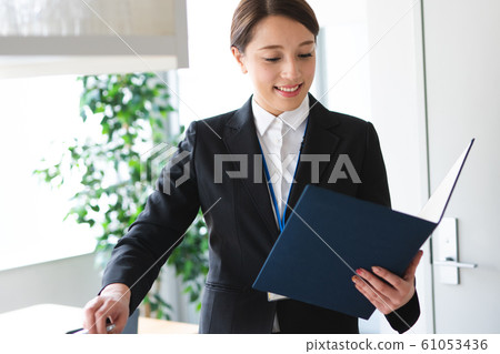 Real estate brokerage young woman 61053436
