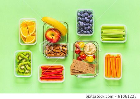 Healthy snack on a pastel background. 61061225