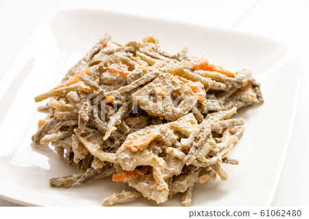 Burdock and lotus root salad. 61062480