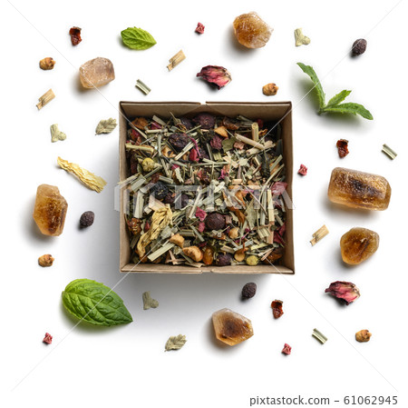 Herbal tea, mint and caramel sugar on a white background. The view from the top 61062945