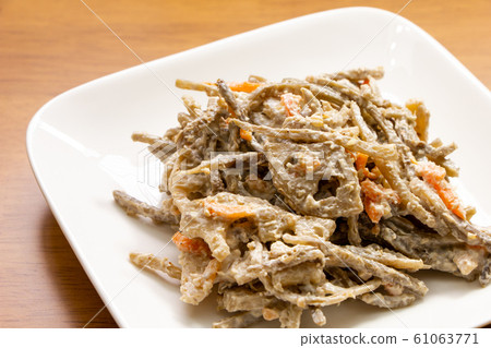 Burdock and lotus root salad. Burdock and lotus root salad. 61063771