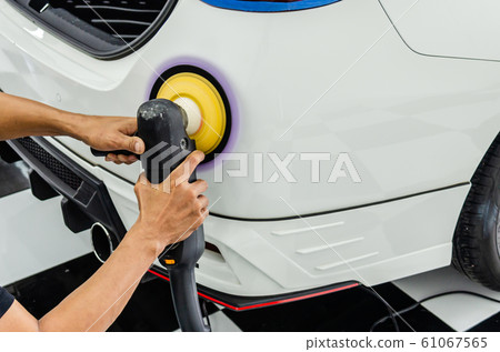 hands holding the work tool polish car. hands holding the work tool polish car. 61067565