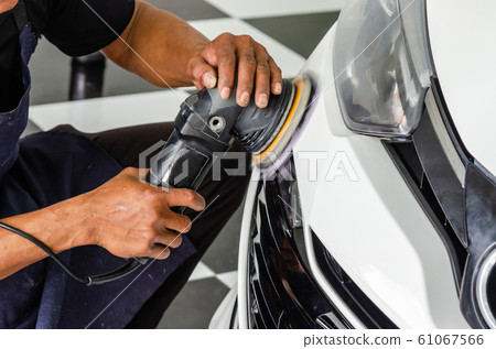 hands holding the work tool polish car. hands holding the work tool polish car. 61067566