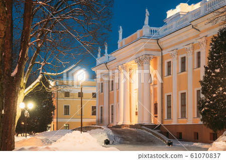 Gomel, Belarus. City Park In Winter Night. Rumyantsevs And Paskeviches Palace In Homiel Park, Belarus. Famous Local Landmark In Snow Gomel, Belarus. City Park In Winter Night. Rumyantsevs And Paskeviches Palace In Homiel Park, Belarus. Famous Local Landmark In Snow 61070837