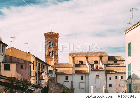 Terracina, Italy. Houses And Tower Of Cathedral Of San Cesareo Built On Podium Of Temple Of Roma And Augustus Terracina, Italy. Houses And Tower Of Cathedral Of San Cesareo Built On Podium Of Temple Of Roma And Augustus 61070943