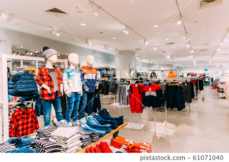 Mannequins Dressed In Children Male Man Casual Clothes And Colorful Bright Children Clothes On Shelves And Hanger In Store Of Shopping Center Mannequins Dressed In Children Male Man Casual Clothes And Colorful Bright Children Clothes On Shelves And Hanger In Store Of Shopping Center 61071040