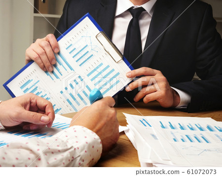 Business team works with marketing plan 61072073