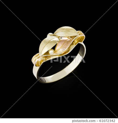 Gold ring on black background 61072342