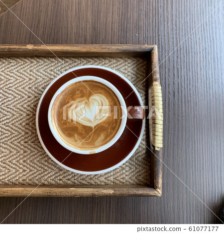 A cup of coffee 61077177