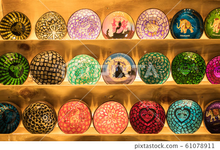 Close-up view of the colorful handicraft bowls 61078911