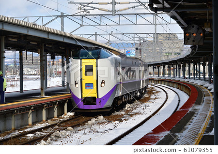 Photographing the winter scene of a limited express train departing at Hakodate Station in Hakodate City, Hokkaido Photographing the winter scene of a limited express train departing at Hakodate Station in Hakodate City, Hokkaido 61079355
