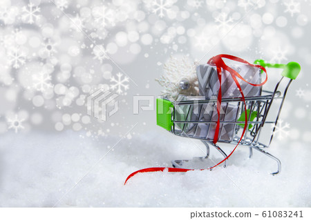 Christmas gifts and shopping cart. 61083241