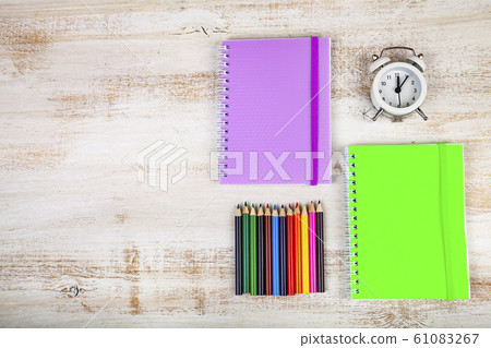 Items for the school on a wooden table. Items for the school on a wooden table. 61083267