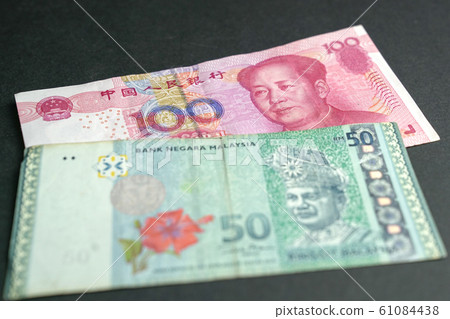 Chinese Yuan (RMB) and Malaysia Ringgit (MYR) Chinese Yuan (RMB) and Malaysia Ringgit (MYR) 61084438