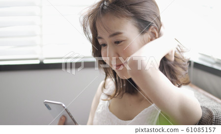 Beauty image Smartphone operation Beauty image Smartphone operation 61085157