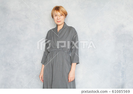 Mature beauty. Pretty woman with short ginger hair 61085569