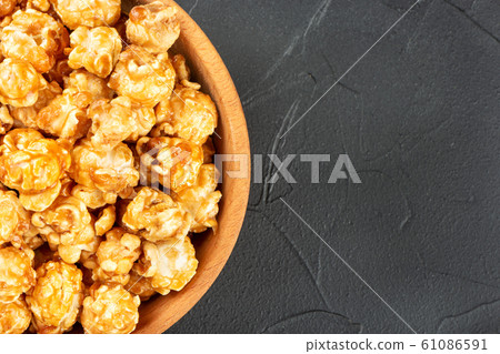 Caramel popcorn in bowl Caramel popcorn in bowl 61086591