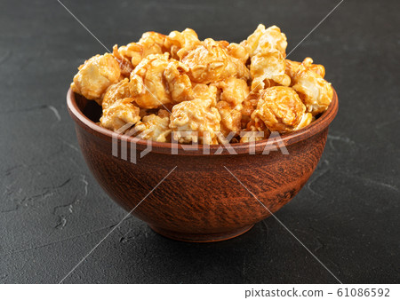 Caramel popcorn in bowl Caramel popcorn in bowl 61086592