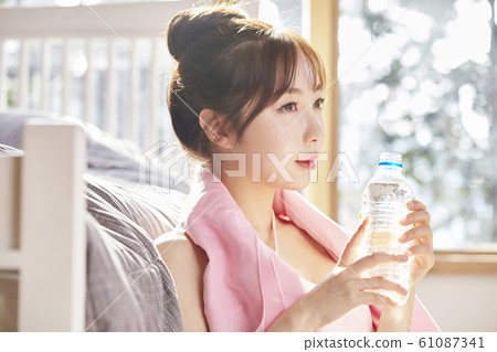 Young woman, exercise, health, diet, sport, relax, rest, water, bottle, bedroom, room, house Young woman, exercise, health, diet, sport, relax, rest, water, bottle, bedroom, room, house 61087341