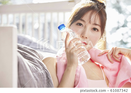 Young woman, exercise, health, diet, sport, relax, rest, water, bottle, bedroom, room, house Young woman, exercise, health, diet, sport, relax, rest, water, bottle, bedroom, room, house 61087342