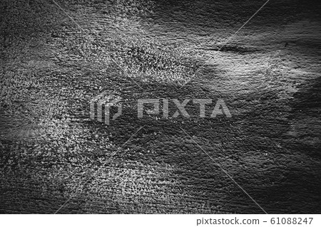 Background texture. Hard old painted black wall in grunge style. Surface for design and text. Close up view Background texture. Hard old painted black wall in grunge style. Surface for design and text. Close up view 61088247