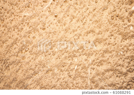 Background dotted grainy texture. Hard old painted wall in grunge style. Surface for design and text. Close up view Background dotted grainy texture. Hard old painted wall in grunge style. Surface for design and text. Close up view 61088291