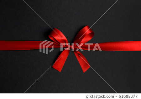 Red bow on black Red bow on black 61088377