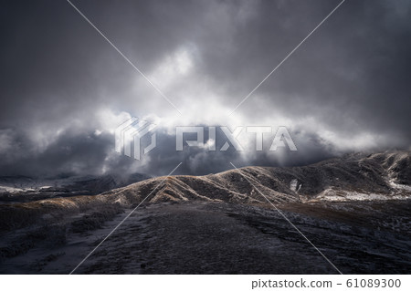 Light shines into the snowy field. Kumamoto Prefecture, Aso Mountain, Kusachiri Light shines into the snowy field. Kumamoto Prefecture, Aso Mountain, Kusachiri 61089300