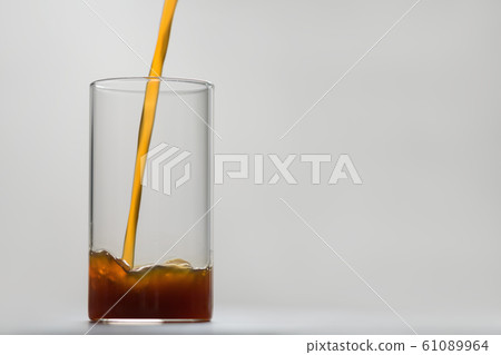 Black coffee pour into glass with copy space Black coffee pour into glass with copy space 61089964