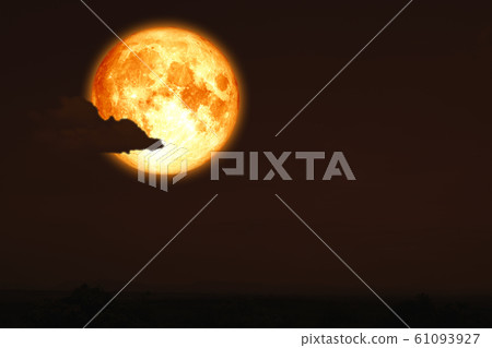 full egg moon back on silhouette mountain on night 61093927