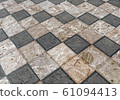 Checkered style floor with black and white tiles 61094413