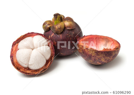 Closeup of purple mangosteen on white background Closeup of purple mangosteen on white background 61096290