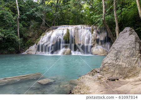Clean green emerald water from the waterfall Clean green emerald water from the waterfall 61097814