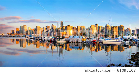 Beautiful view of Vancouver skyline with harbor at sunset, British Columbia, Canada 61099108