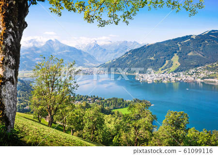 Beautiful landscape with Alps and Zeller See lake in Zell am See, Austria Beautiful landscape with Alps and Zeller See lake in Zell am See, Austria 61099116