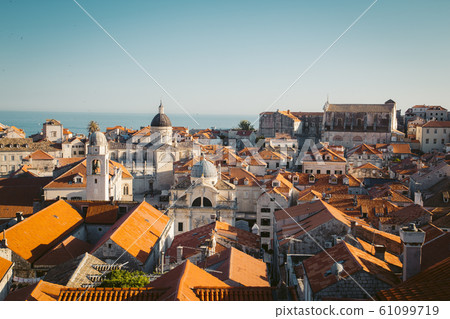 Dubrovnik terra cotta rooftops at sunset, Croatia 61099719