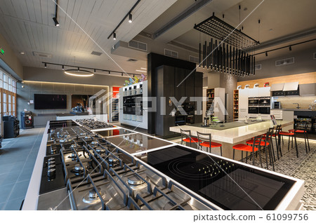 Brand new gas stoves in apliance store showroom 61099756