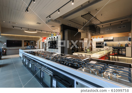 Brand new gas stoves in apliance store showroom 61099758
