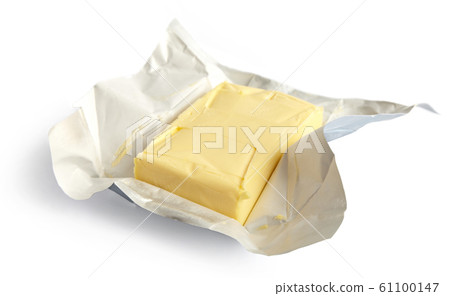 Piece of butter, isolated on white background, selective focus 61100147