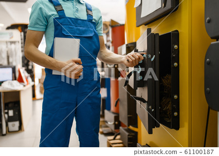 Plumber buying boiler with furnace, plumbering 61100187