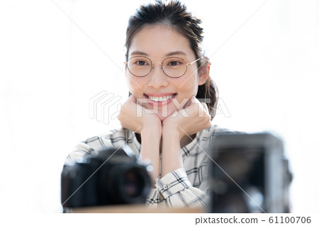 Female camera lifestyle Female camera lifestyle 61100706
