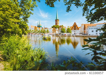 Historic city of Luebeck with Trave river in summer, Schleswig-Holstein, Germany Historic city of Luebeck with Trave river in summer, Schleswig-Holstein, Germany 61100857