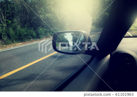 Landscape in the side view mirror of a car, on Landscape in the side view mirror of a car, on 61101963
