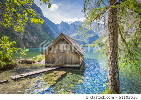 Lake Obersee with boat house in summer, Bavaria, Germany Lake Obersee with boat house in summer, Bavaria, Germany 61102616