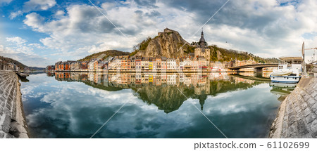 Historic town of Dinant with river Meuse at sunset, province of Namur, Wallonia, Belgium 61102699