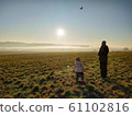Dad and daughter flying RC plane 61102816