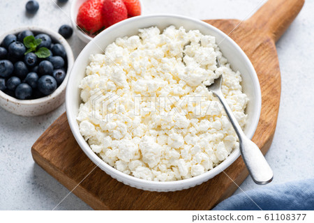Curd cheese, cottage cheese. Homemade white cheese 61108377