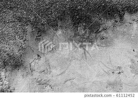 Texture of a concrete wall with cracks and 61112452